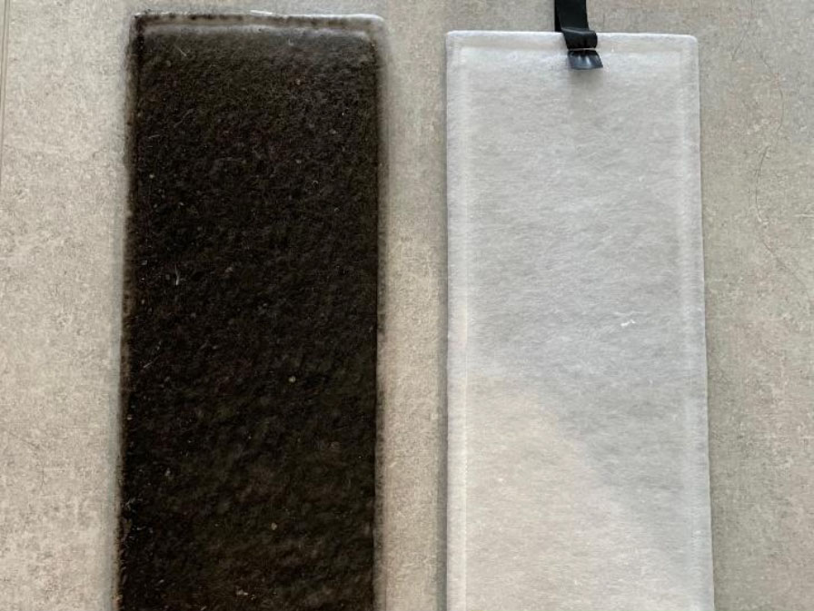 A close up of a black and white material filter next to eachother.